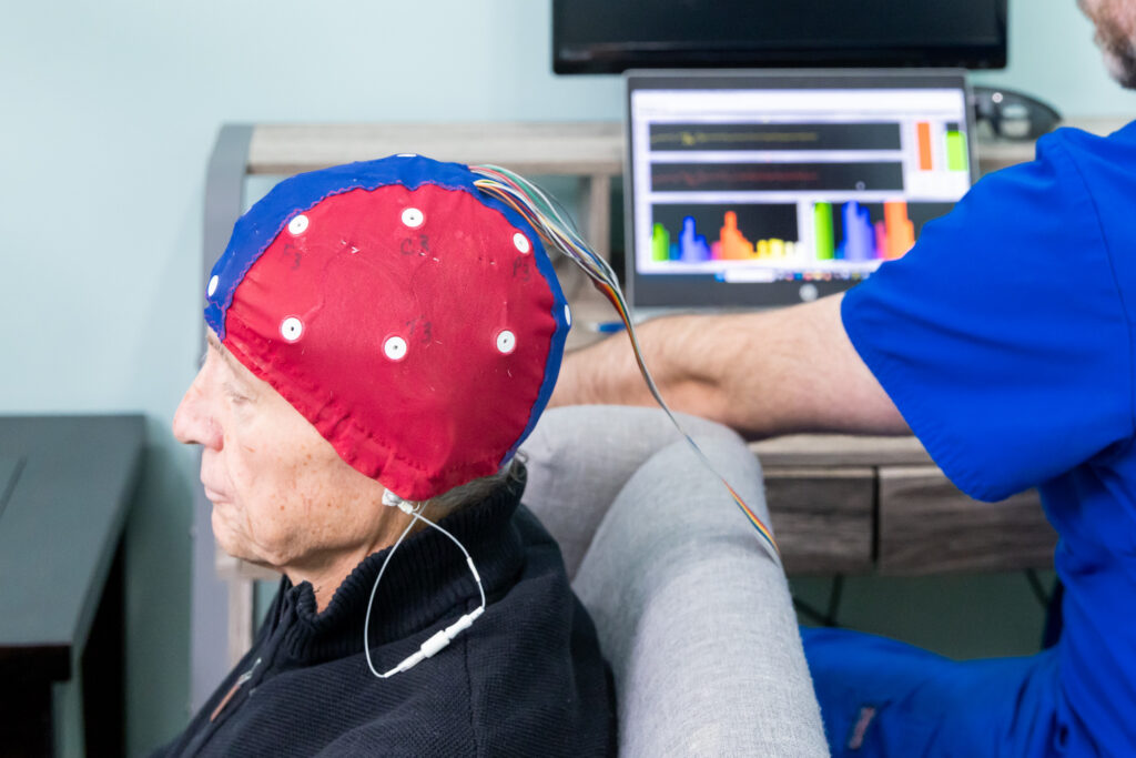 Woman receives neuropathy treatment near Cedar Rapids through neurofeedback, HakoMed, and IV therapy