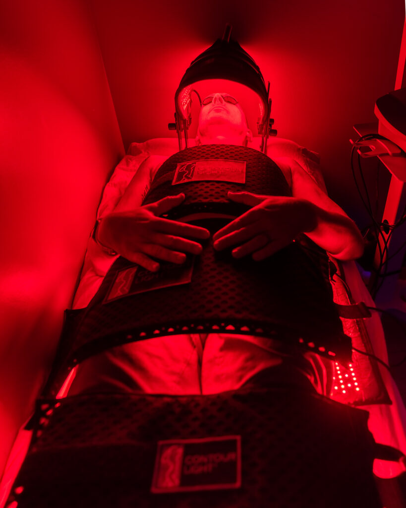 Patient lays on treatment table as part of a comprehensive treatment plan